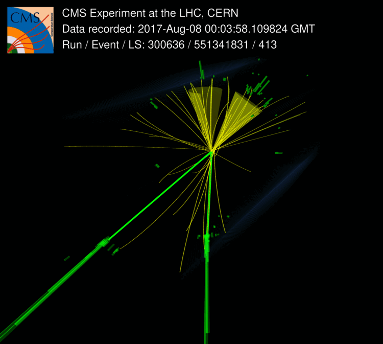 CMS event display of a candidate event: two green electron tracks consistent with a Z boson decay, and two yellow jet cones containing tracks from secondary vertices displaced from the collision point.